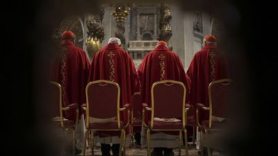 Who are the cardinals tipped to be the next pope one week before the conclave?