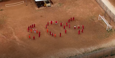 Detained Migrants Display 'SOS' Message to Passing Plane Fearing Deportation to El Salvador