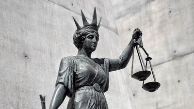 Man accused of overseas child abuse to stay behind bars