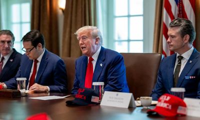 Waltz was photographed checking Signal on his phone during cabinet meeting – as it happened