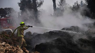Footage captures thick smoke rising from blaze west of Jerusalem
