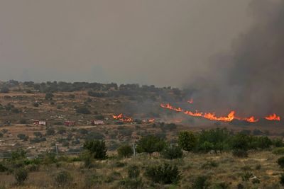 Israel Reopens Key Roads As Firefighters Battle Blaze