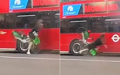 Lime e-bike rider miraculously avoids serious injury after clipping bus and 'face planting' road