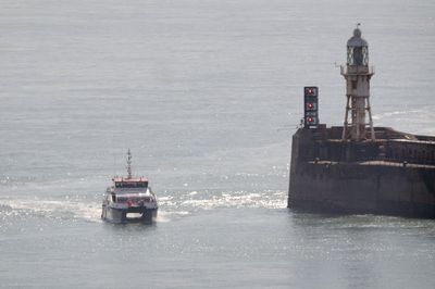 Migrants cross English Channel in warm spell as arrivals pass 11,000 for year