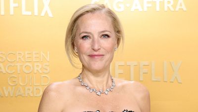 Gillian Anderson's breezy shirt dress is the ultimate warm-weather staple, keeping you cool, comfortable, and effortlessly chic