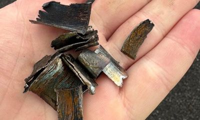 Hundreds of cars left with flat tyres after sharp debris spills over 30km stretch of busy motorway into Sydney