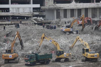 Five more bodies pulled from rubble