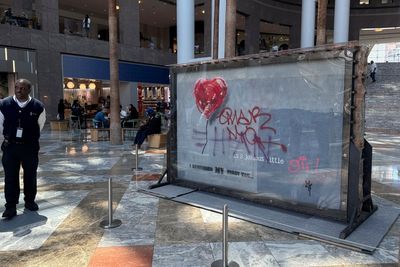 Banksy's ‘Broken Heart' painting defaced on a Brooklyn wall is up for sale