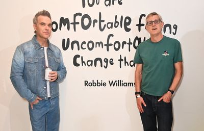 Celebs gather in support of Robbie Williams at launch of singer's art project
