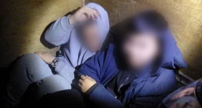 Moment UK migrant smuggling operation foiled as people found squashed into rubbish-strewn van