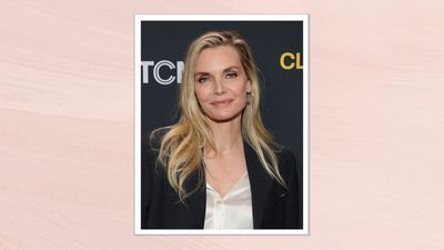 Bored of middle partings? Michelle Pfeiffer's side-swept hair radiates effortless chic