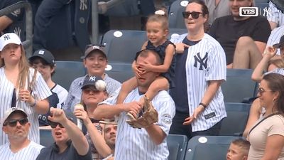 Epic Dad Moment: Father Makes Unbelievable, Eyes-Covered Catch at Yankees Game