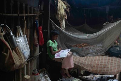 AP PHOTOS: A school under a highway is a sanctuary for disadvantaged children in India