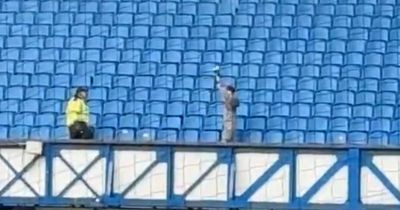 Watch moment Celtic supporter is spotted in empty Rangers end after derby draw