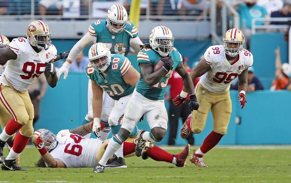 Tannehill throws three TD passes as Dolphins hold on in win over 49ers