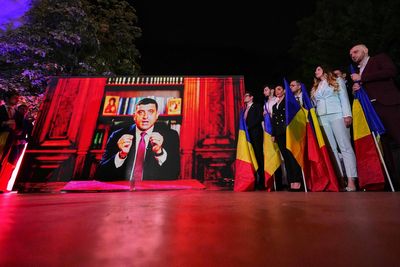 Hard-right leader to face runoff after winning first round of Romania’s presidential election rerun