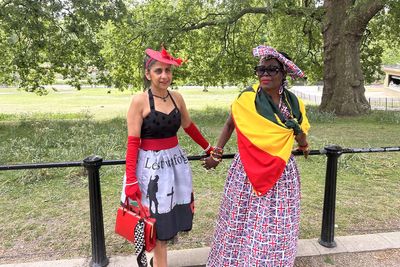 Visitors look the part in special dresses made for VE Day celebrations