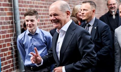 Scholz to hand over power in Germany to sound of feminist anthem Respect