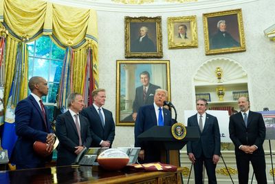 Trump celebrates with NFL commissioner Roger Goodell to announce the 2027 NFL draft in DC