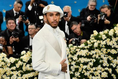 The Latest: The Met Gala opens as rain fails to dim the stars for fashion's biggest night