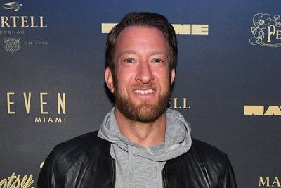 Barstool Sports founder retracts Auschwitz tour offer to customer in antisemitic sign incident