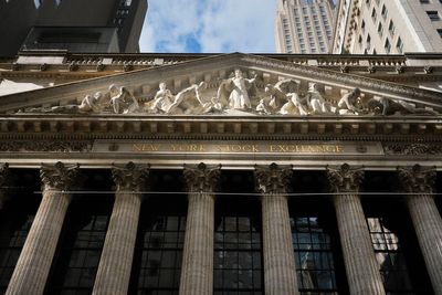 Asian shares are mostly higher after Wall St breaks its winning streak