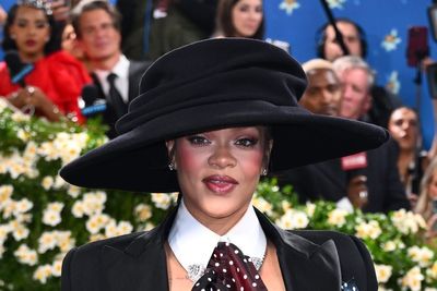 Rihanna debuts baby bump on star-studded Met Gala blue carpet