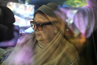 Pressure mounts on Bangladesh’s interim leader to hold elections as former premier returns