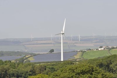 Minister urges ‘much greater development’ of solar on factories and homes