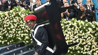 “It’s jokingly the worst rap album in history because there are no lyrics on it at all”: It turns out there’s a reason why André 3000 turned up at the Met Gala with a grand piano on his back