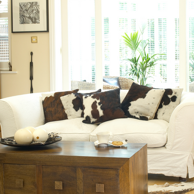 Cow print is the fashion-forward alternative to the stripe trend – how to style the look at home