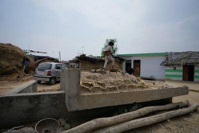 India fires missiles across the frontier with Pakistan, killing at least 1 child, officials say