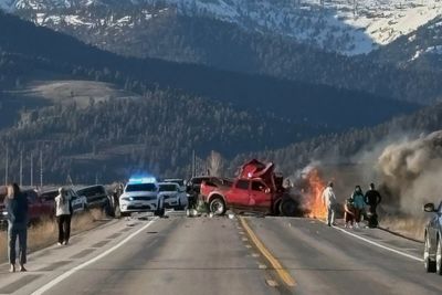 Truck crossed center line in crash with tour van that killed 7 near Yellowstone, police say