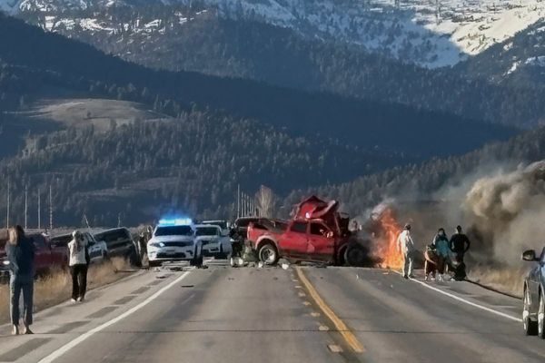 Truck crossed center line in crash with tour van that killed 7 near Yellowstone, police say