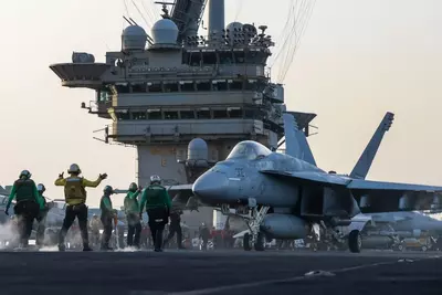 Pilot forced to eject as another $60M fighter jet slides off the USS Harry Truman and is lost at sea