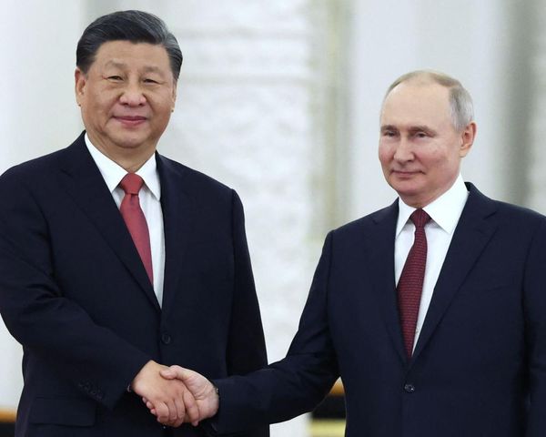 Xi Jinping begins four-day Russia visit as Ukrainian drones attack Moscow