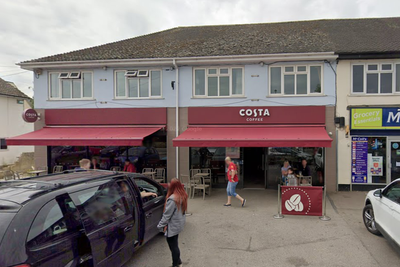 Three injured as car drives into Costa Coffee window