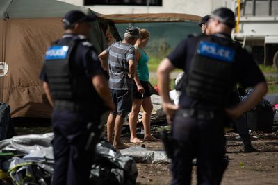 Police, rangers and excavators move in to Brisbane parks as tent city residents face eviction