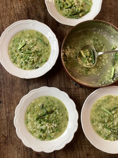 Rachel Roddy’s recipe for asparagus, pea and rice soup-stew