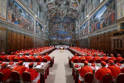 The Latest: Cardinals vote in the Vatican for a second day to elect a new pope