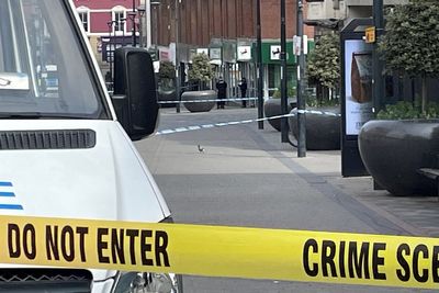 Man charged with murder after fatal stabbing inside city centre bank