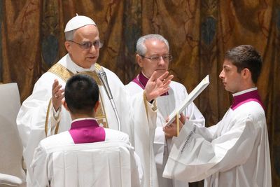 Pope Leo XIV says Catholic Church must illuminate 'dark nights of this world' in first Mass