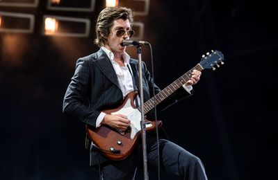 Arctic Monkeys' Alex Turner makes rare appearance to honour manager
