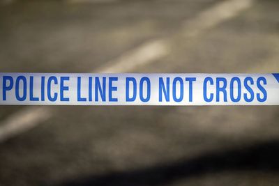 Man arrested on suspicion of murder and robbery after death of 87-year-old