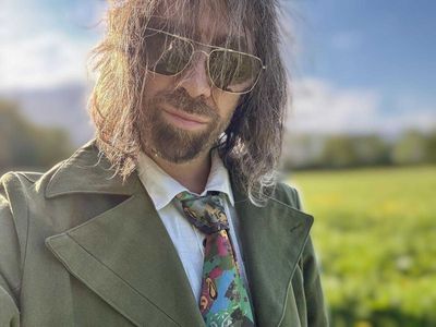 The voice of Disco Elysium's Ancient Reptilian Brain performed the game's famous karaoke scene live and in costume