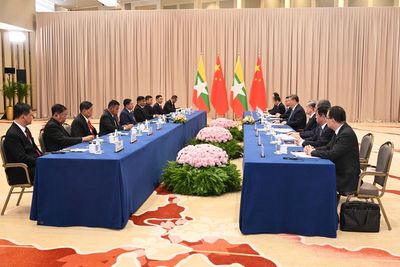 Myammar's military government chief has first meeting with China's leader since taking power in 2021