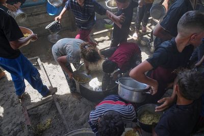 Israeli airstrikes kill 23 in Gaza as outcry over aid blockade grows