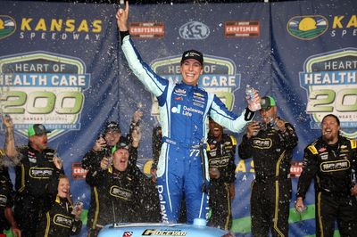 With a middle finger out the window, Carson Hocevar wins Kansas Truck race