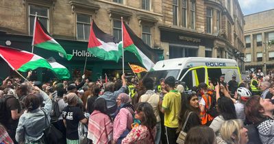 Activists surround police van as man 'detained' at pro-Palestine protest