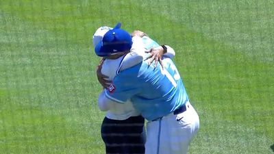 Salvador Perez's Mom Throws an Awesome Strike During Her Mother's Day Ceremonial Pitch
